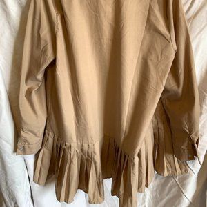 Cotton beige shirt with colour and great pleats on the bottom